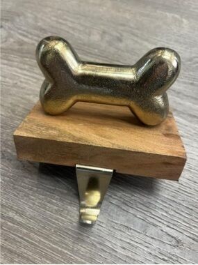 Gold Dog Bone Wall Hook on Wood